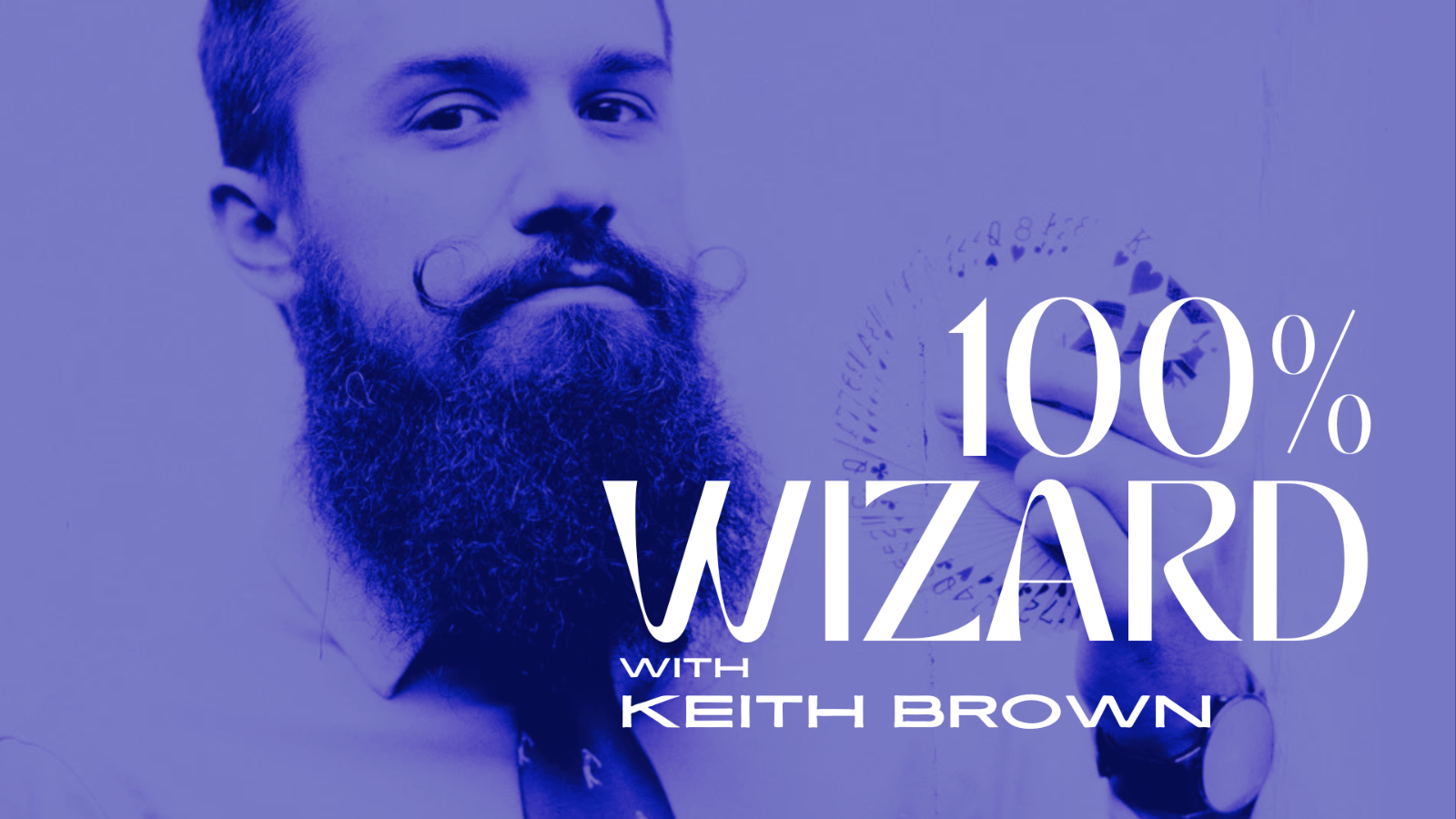 Bearded magician Keith Brown holds a fan of playing cards near his face. The entire image is in blue. There is white text that says 100% Wizard with Keith Brown.