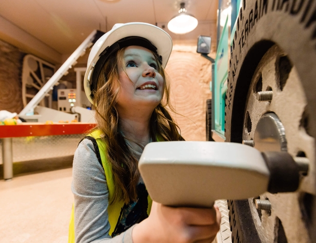A young girl at a science museum