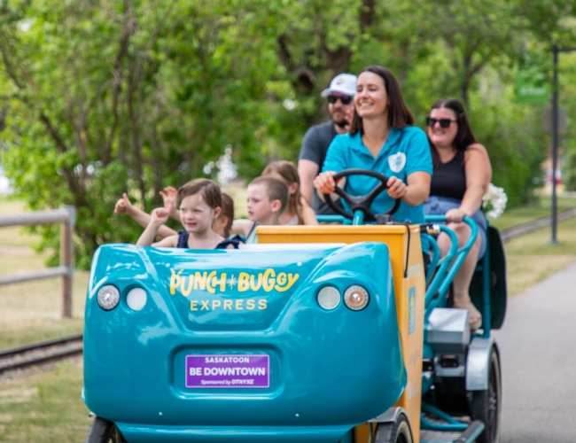 Family ridding in a buggy