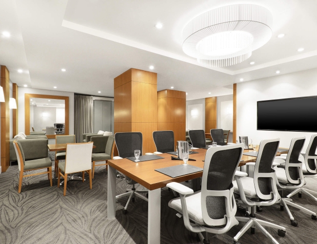 Meeting room with a large table and office chairs