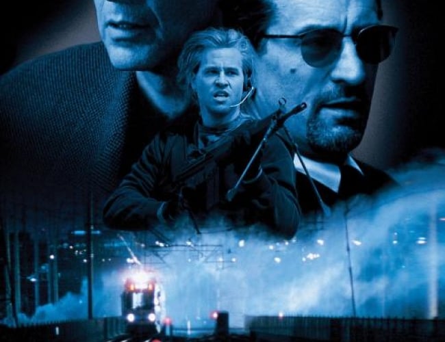Image from the movie Heat. Shows a train station and then images of Al Pacino and Robert De Niro.