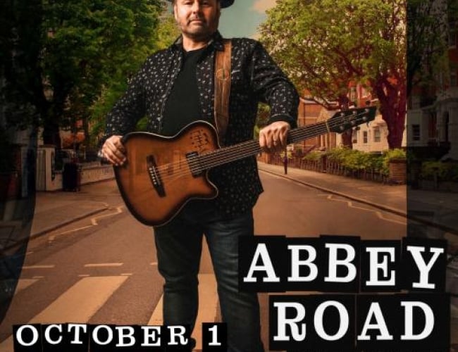 Image of Martin Sexton wearing all black and a brown guitar standing in the middle of a crosswalk with trees lining the street behind him. Text is written: The Martin Sexton Abbey Road Show October 1 The Broadway Theatre