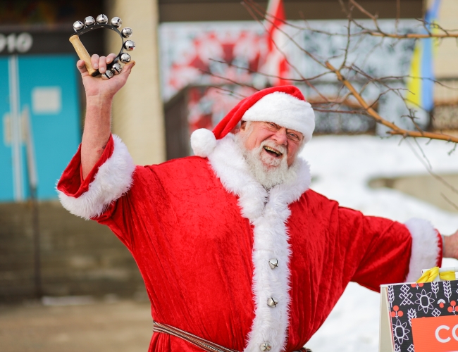 Photo of Santa greeting everyone outside of  the Ukrainian Museum of Canada main entrance