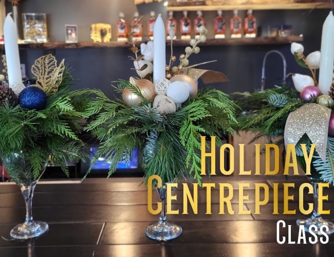 Three beautiful holiday centrepieces line the bar at Black Fox