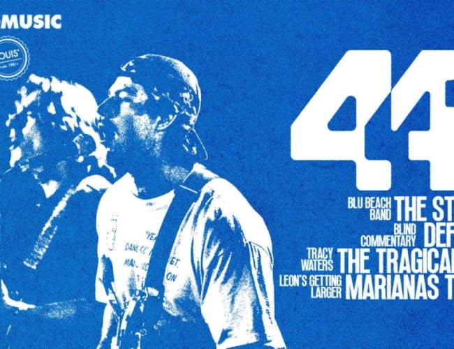 A blue-toned concert poster for “441.” The left side features a high-contrast, grainy photograph of two musicians performing onstage, one singing into a microphone and the other playing guitar. The right side displays the large white text “441,” with the lineup beneath it: Blu Beach Band as The Strokes, Blind Commentary as Deftones, Tracy Waters as The Tragically Hip, and Leon’s Getting Larger as Marianas Trench. Sponsor logos for SaskMusic, The Sheaf Publishing Society, Louis’, and the USSU appear in the t