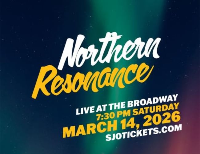 Image of vivid northern lights with green, red, orange and blue lights. 