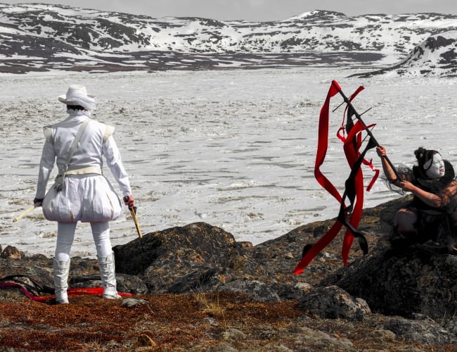 Laakkuluk Williamson and Jamie Griffiths, White Liar and the Known Shore: Frobisher and the Queen (2021) (detail), 2021. Photography on stretched canvas, hat, flagstaff, fool’s gold. Courtesy of the artists.