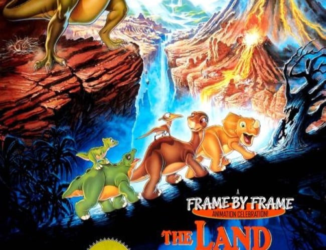 Image of the animated movie The Land Before Time, with small dinosaurs of different kinds travelling with a T-rex in the back. 