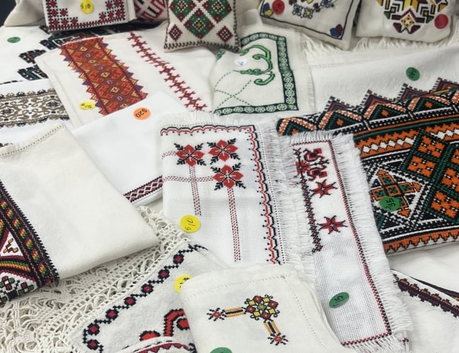 An image of various Ukrainian traditional embroidered items