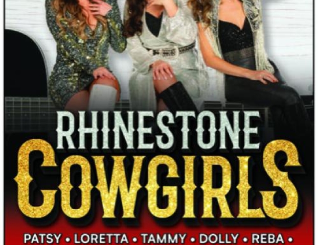 Image of three women dressed up in shiny dresses and cowboy hats, sitting and laughing together.
