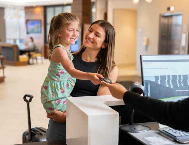 Mom & Daughter Getting Card