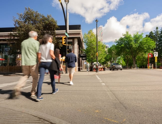 Couple Walking Down Broadway