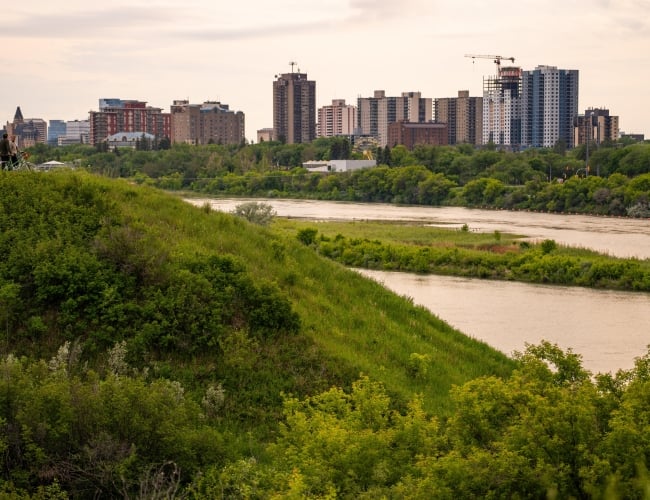Saskatoon Skyline with Couples on Bikes