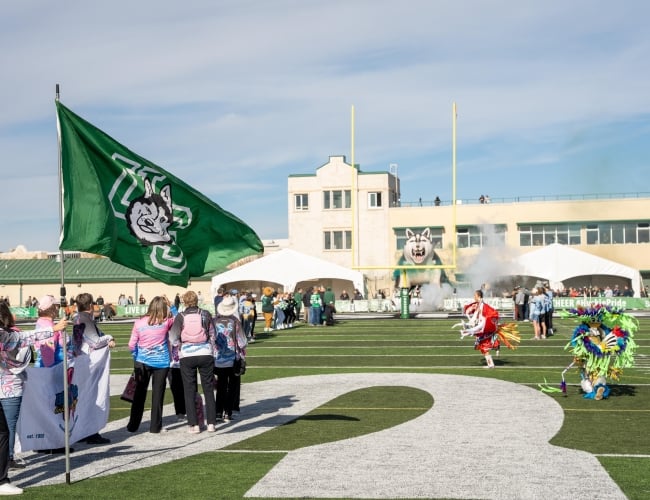 Huskies Football Welcome with Indigenous Dancers