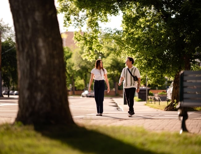 Friends Walking in front of the Bess