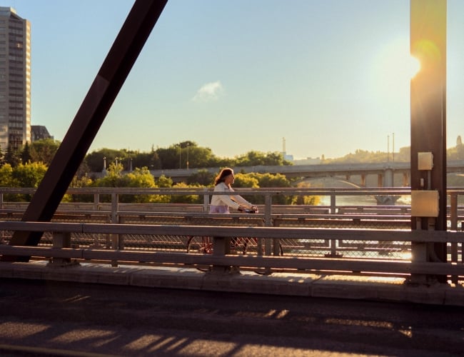 Riding Bike Across Bridge