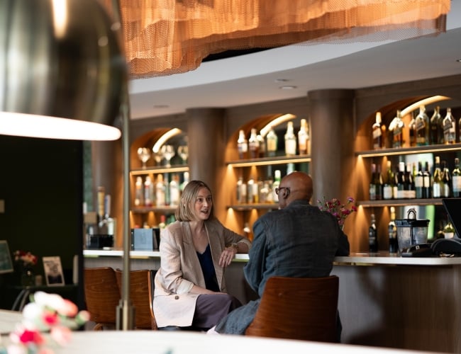 Chatting at the Bar at Park Town Hotel