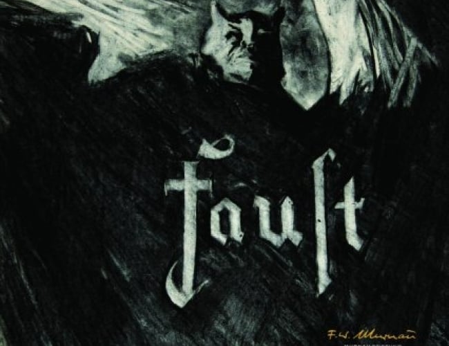 Charcoal drawing of a man with horns, posing dramatically, supposedly the devil.