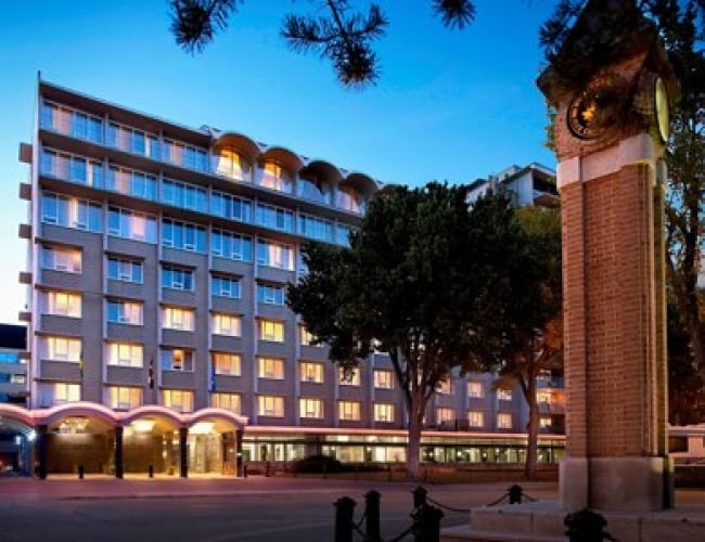 Check in at Sheraton Cavalier Saskatoon Hotel, warm up and hit the hot tub!