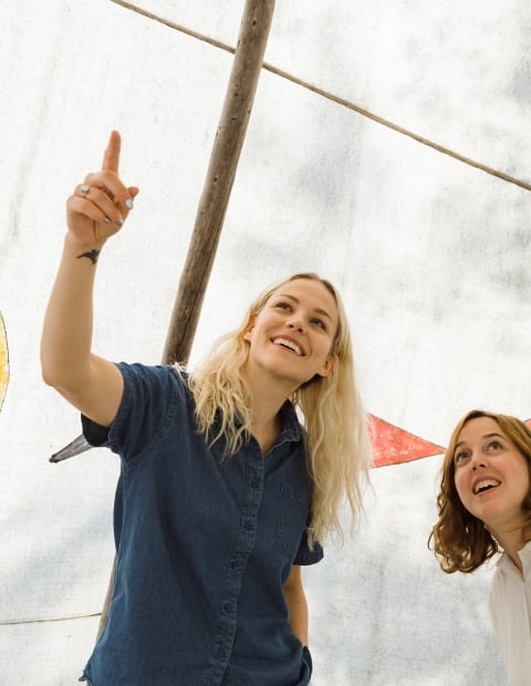 Two women looking at an indigenous exhibition