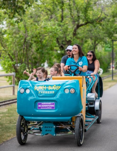 Family ridding in a buggy