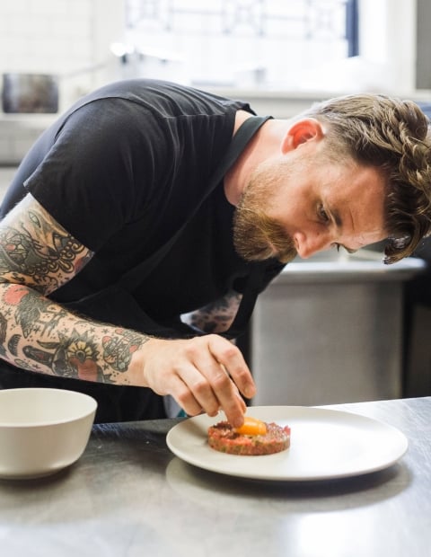 Chef plating food