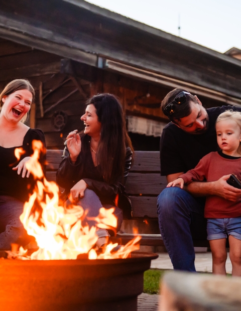 Champetre Laughing by Campfire