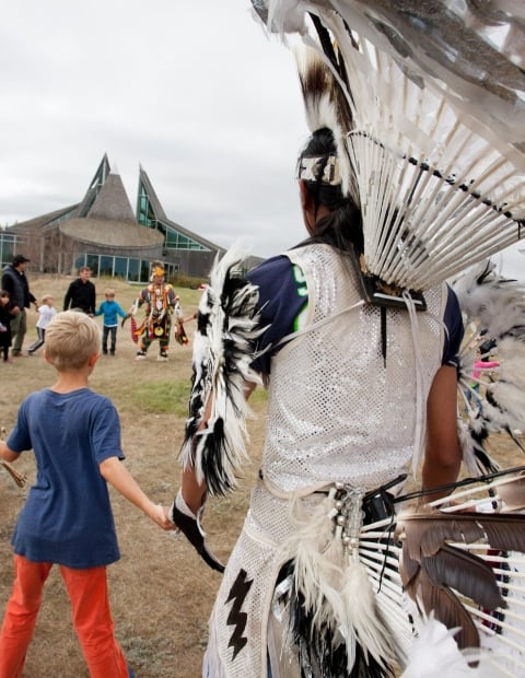 Indigenous Dance with Young Boy
