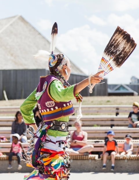 Indigenous Woman Performing Outdoors at Waneskuwin