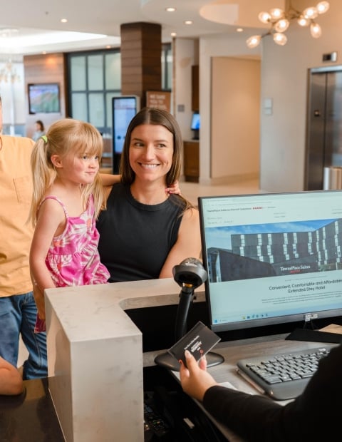 Family at Front Desk