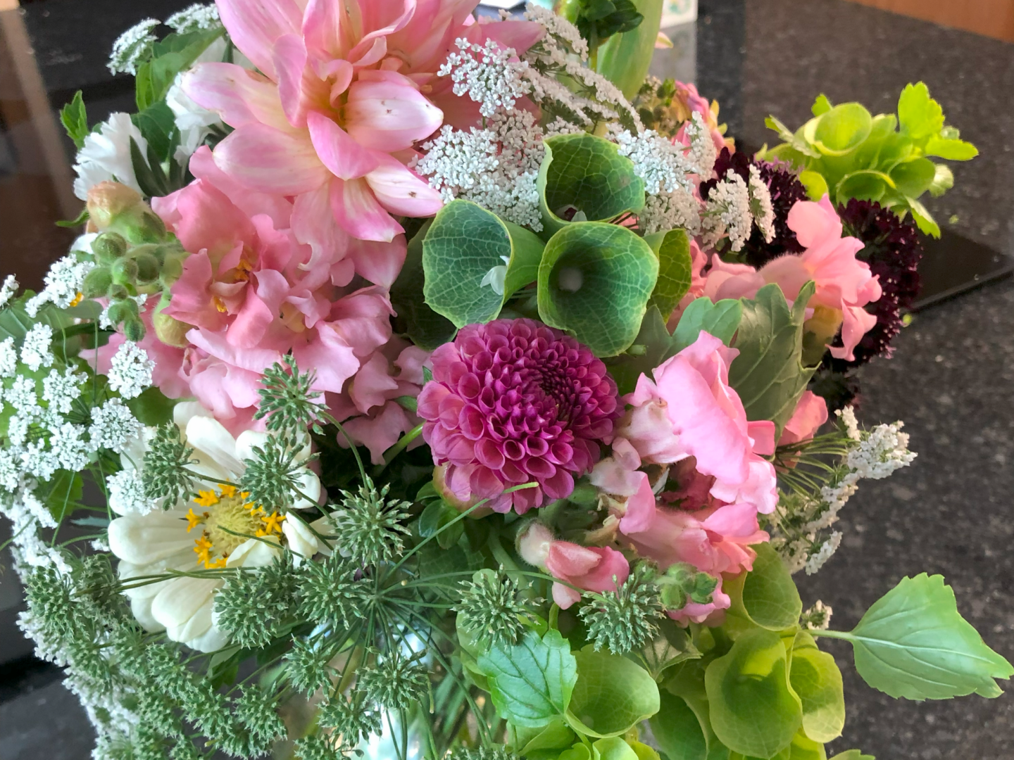 Pink flower arrangement made at the Black Fox Flower Class