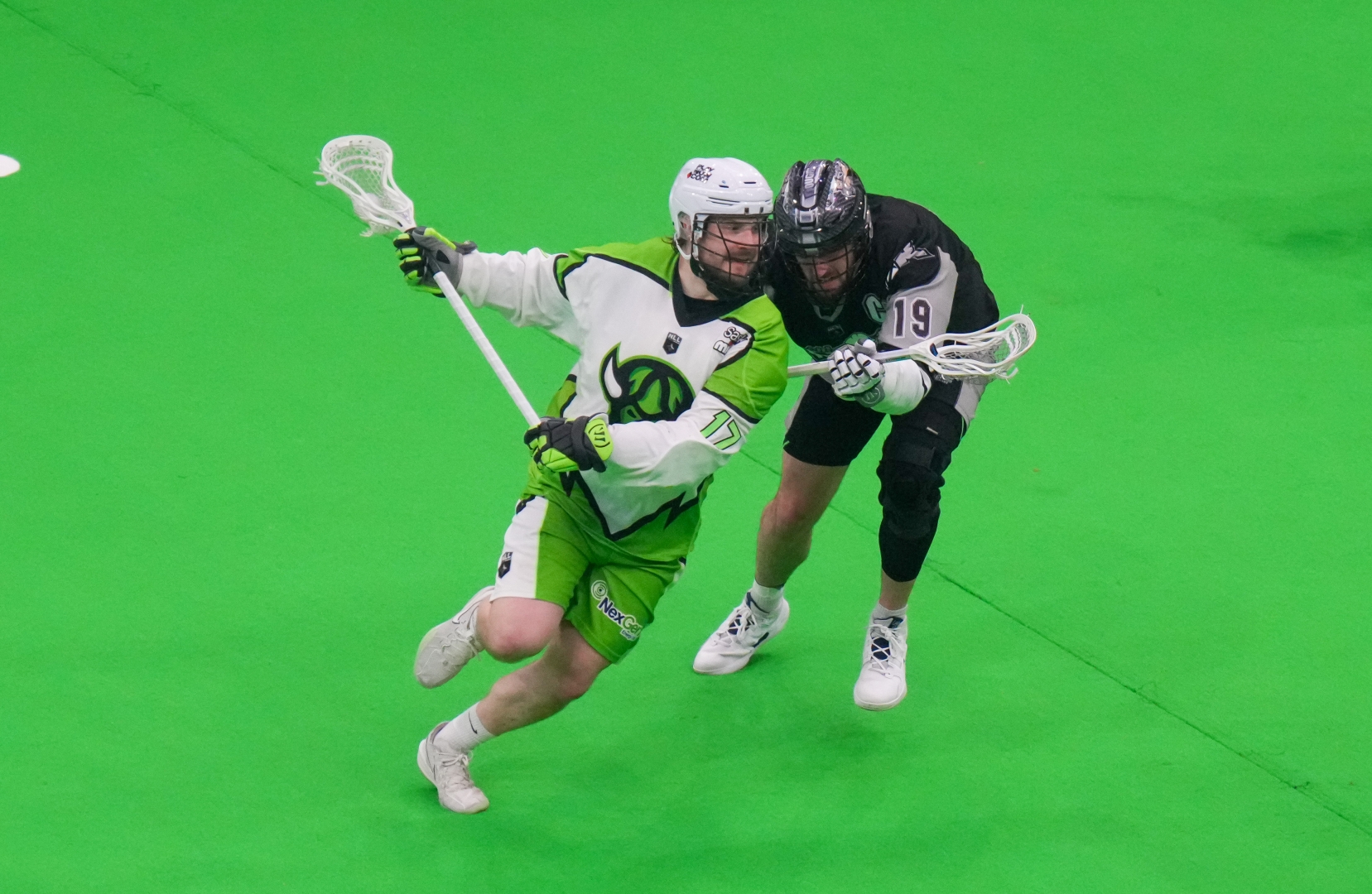Sask Rush Player takes on Calgary Defender