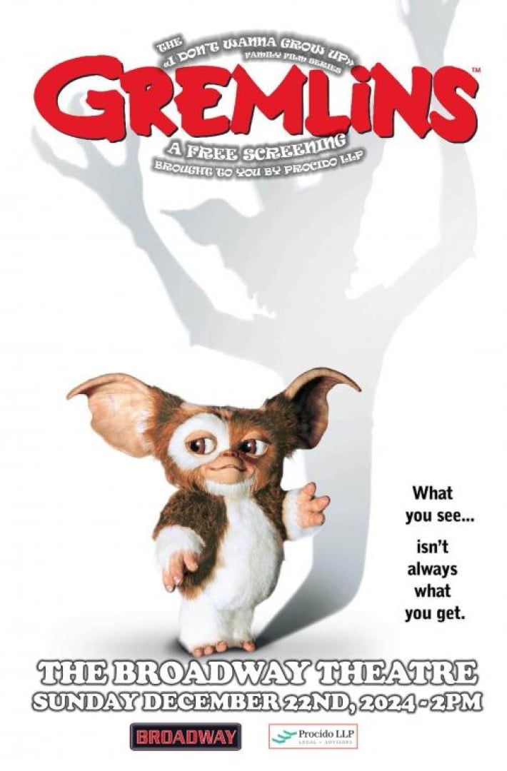 The movie Gremlins poster, with a furby standing there with a shadow of a gremlin. Text says "The I don;t wanna grow up, family film series. Gerlims. A free screening brought to you by PROCIDO LLP. What you see....isn't always what you get. The broadway theatre, sunday december 22nd, 2024 at 2pm."