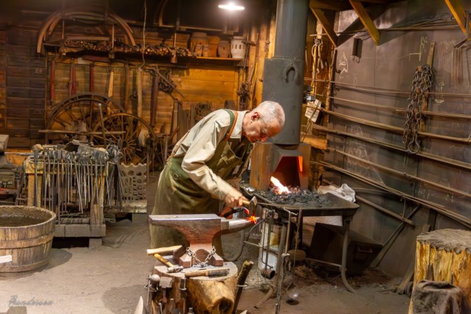 A blacksmith demonstrates the craft at the WDM Saskatoon's forge.