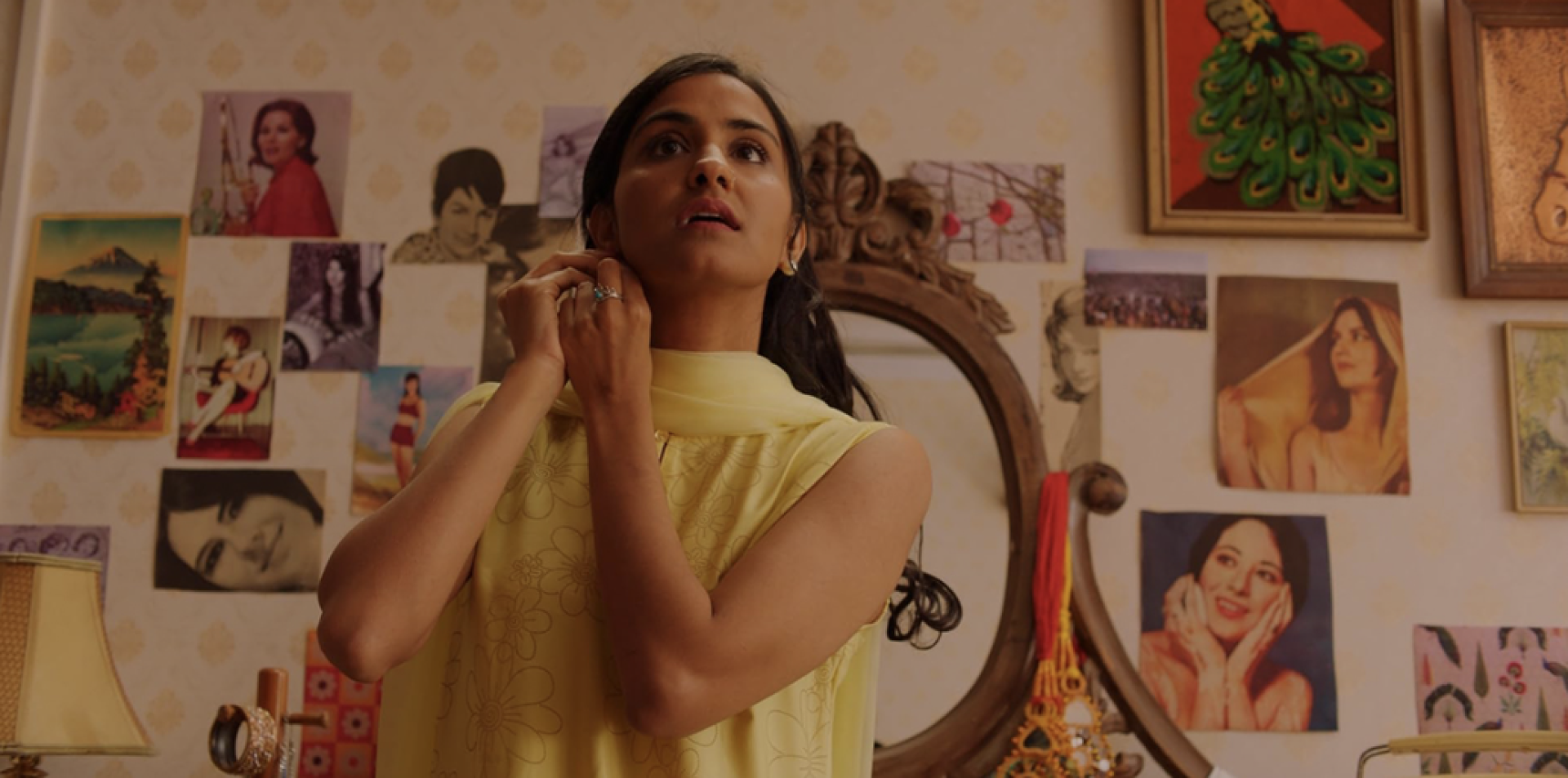 A young women gets dressed for an event