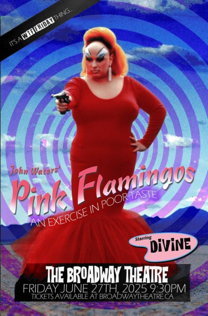 Image from the movie Pink Flamingos. Shows the drag queen Divine in a red dress pointing a gun at someone and other hand on hip standing in the dessert.