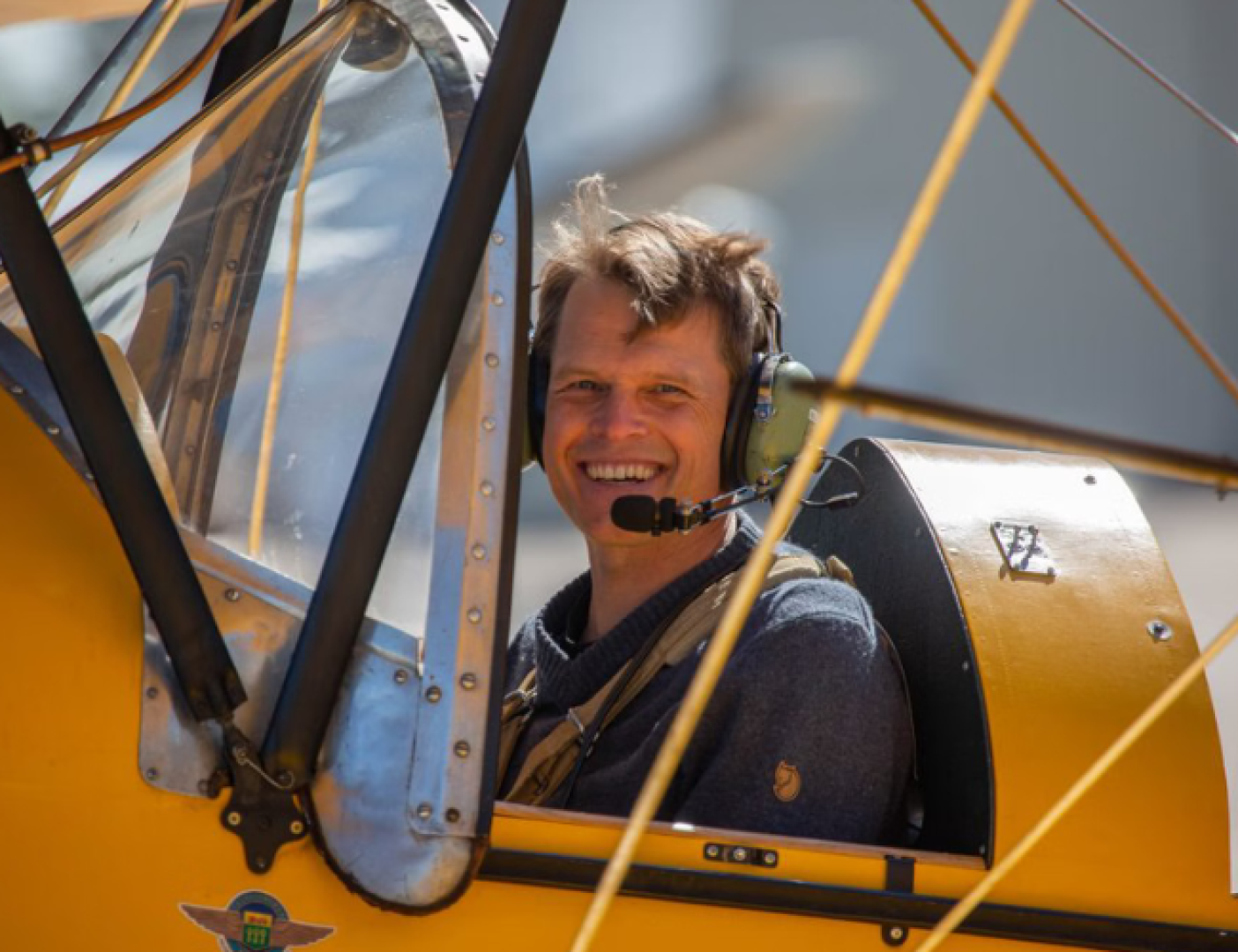Man inside a plane.