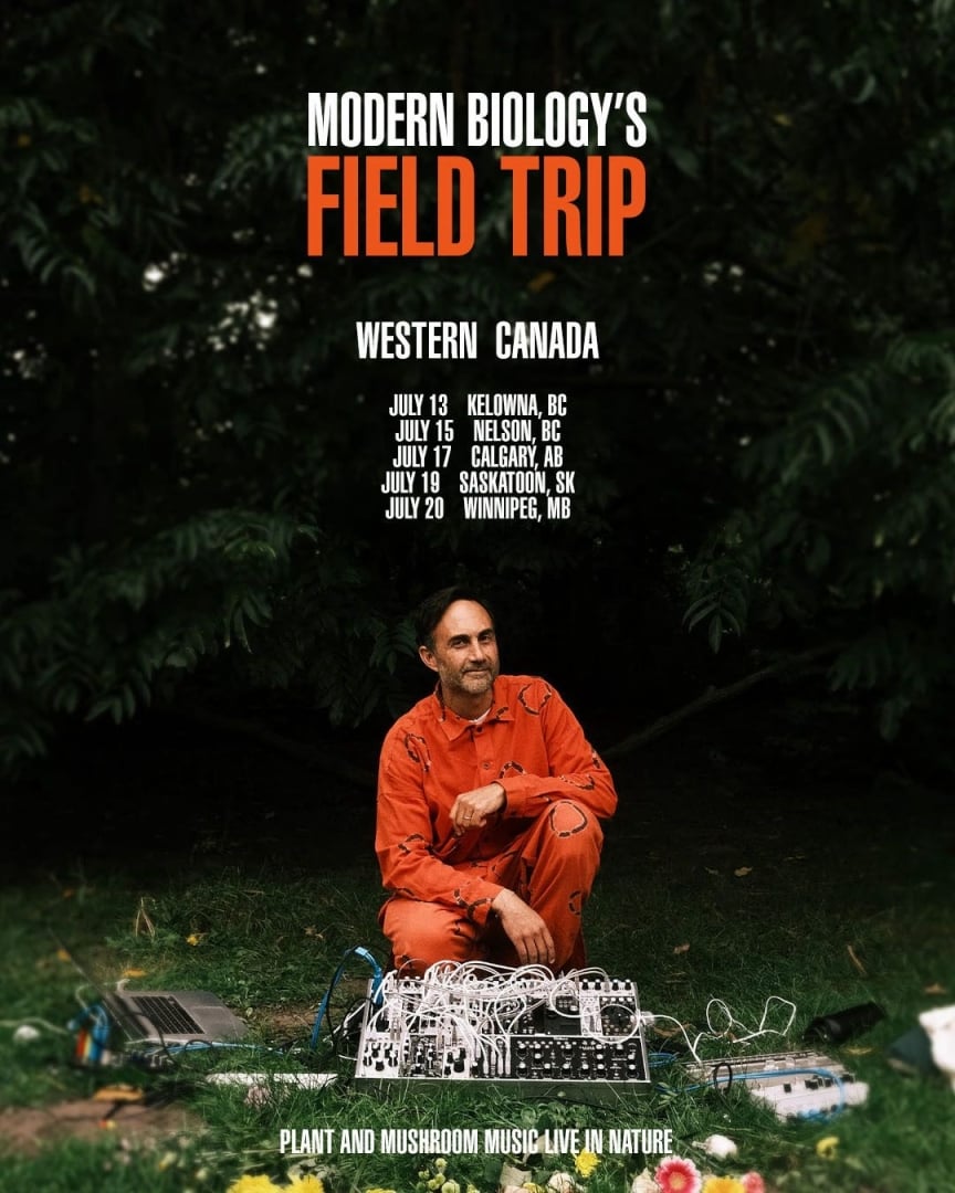 a picture of tarun nayar with a modular synthesizer in nature 