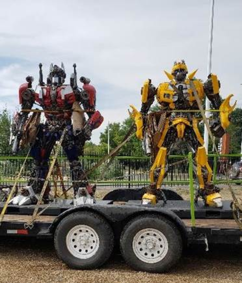 Two transformers on a truck trailer. 