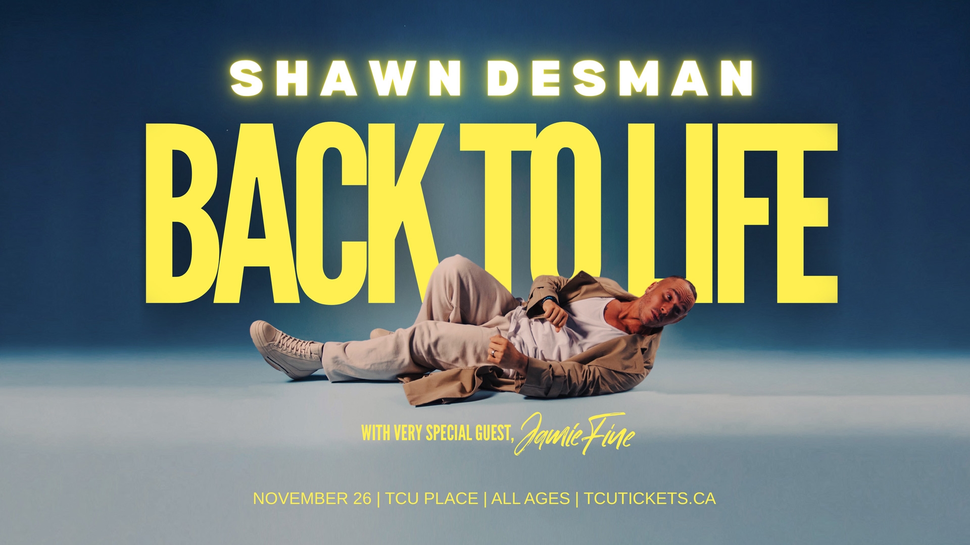 An image with a blue and white background showing a man, Shawn Desman, with yellow letters reading "Shawn Desman Back to Life", promoting his show at TCU Place in Saskatoon, SK on November 26.