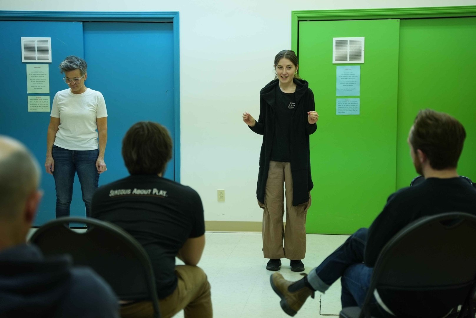 Picture of students in class, with facilitator explaining the exercise.