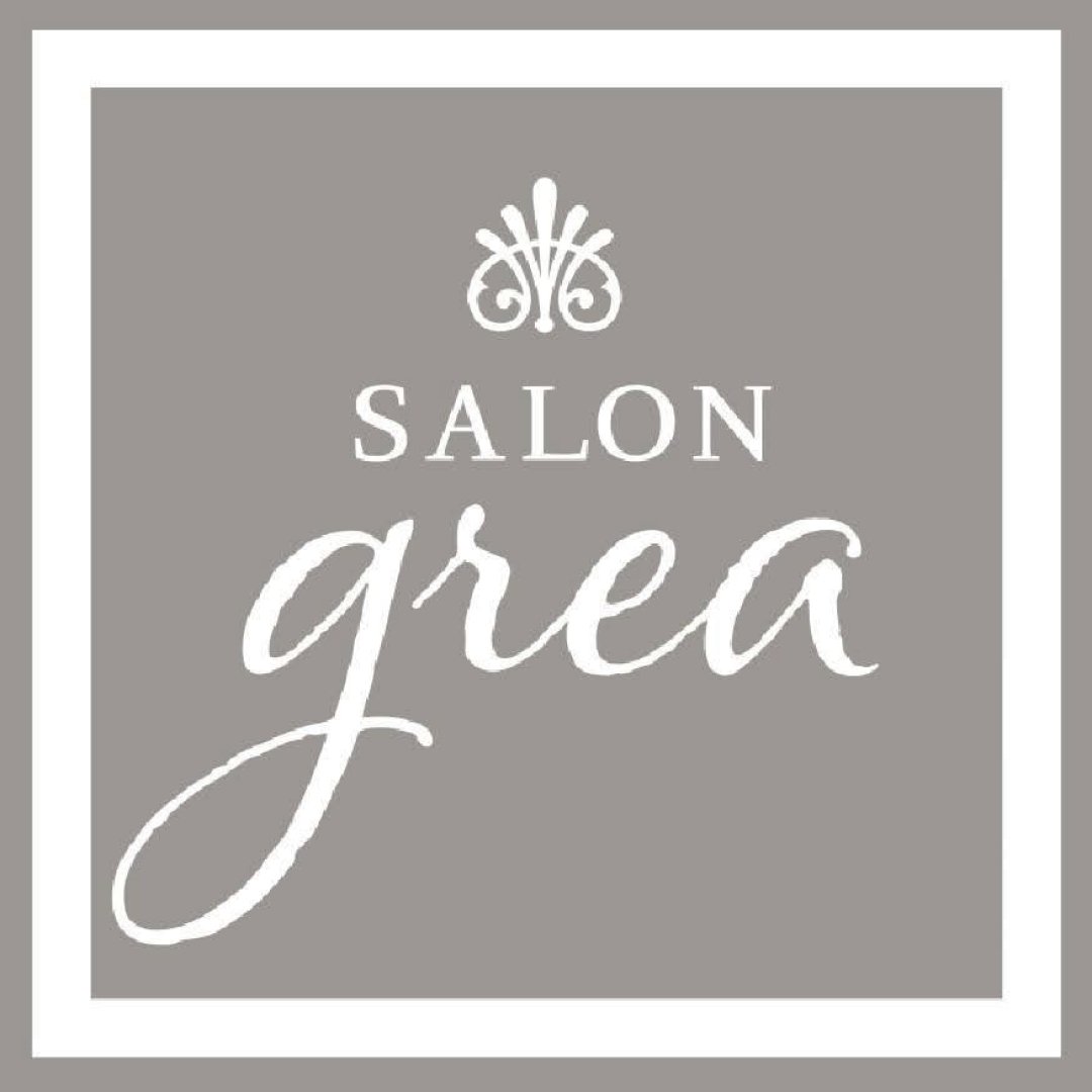Salon Grea logo in grey and white.