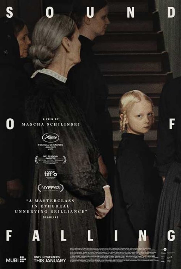Image of three older women in all black clothing looking forward. A little blonde girl is looking towards the camera, dressed in black as well. Her eyes are intense but cannot read the emotion. 