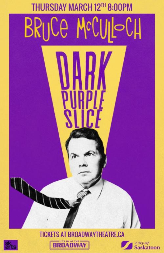 Image of comedian Bruce McCulloch in black and white, wearing a button up shirt and stripped tie, with the tie flying to the side.