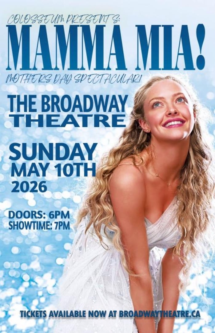 Image of Amanda Seyfried from the movie Mamma Mia, smiling and looking off in the distance while wearing a white one shoulder dress. 