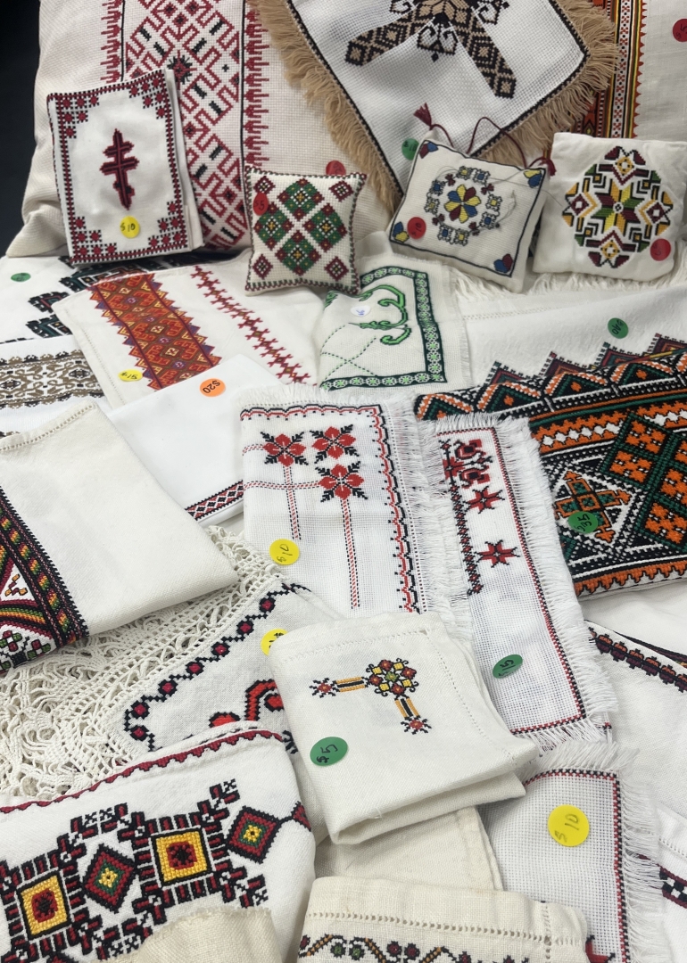 An image of various Ukrainian traditional embroidered items