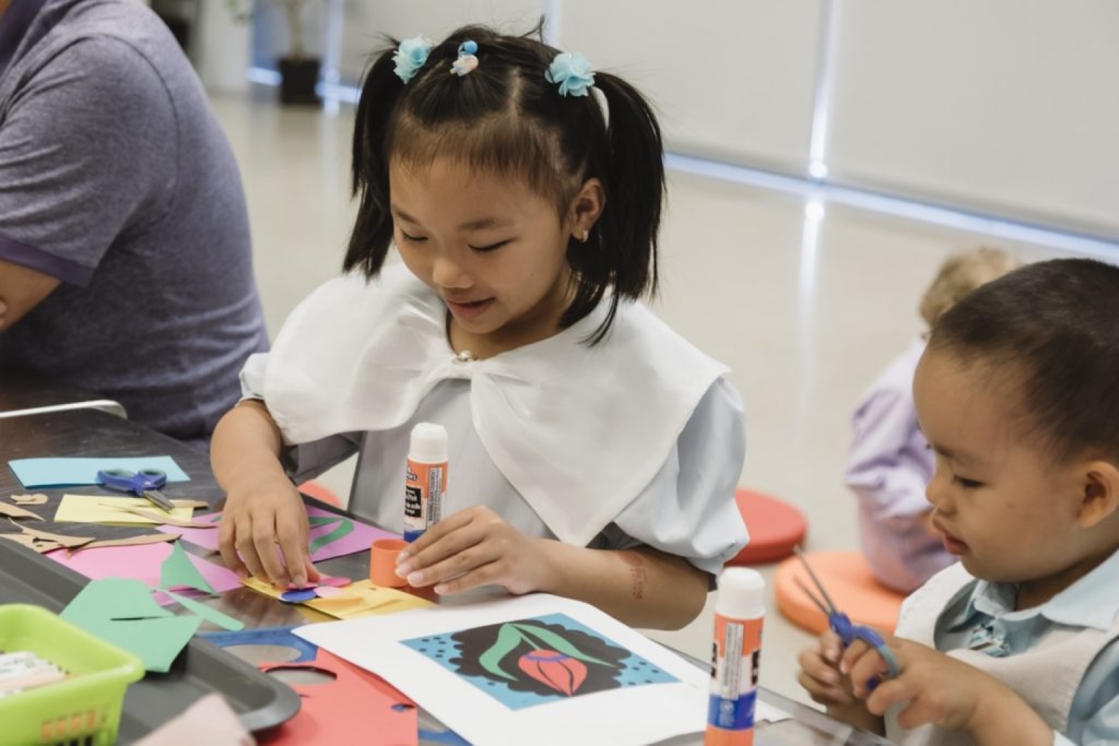 Children participate in art making activities during a past WEGO.