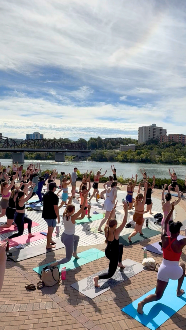 Outdoor Pilates class hosted by the river.