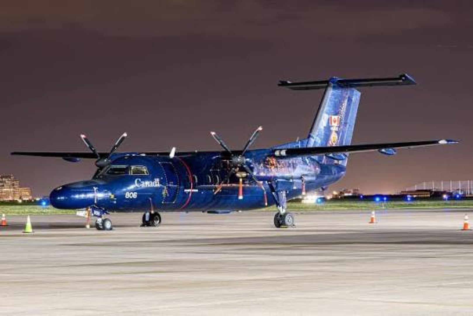 Picture of a Military Dash 8 Aircraft used for navigation training purposes