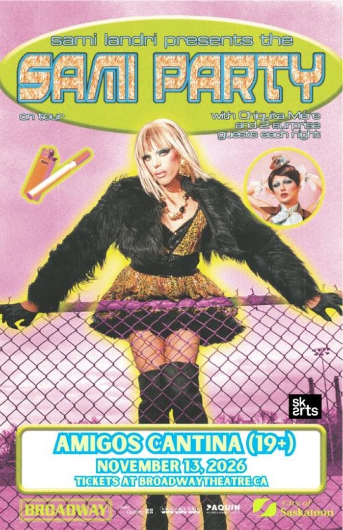 Image of Drag Queen Sami Landri posing against a chain link fence. 